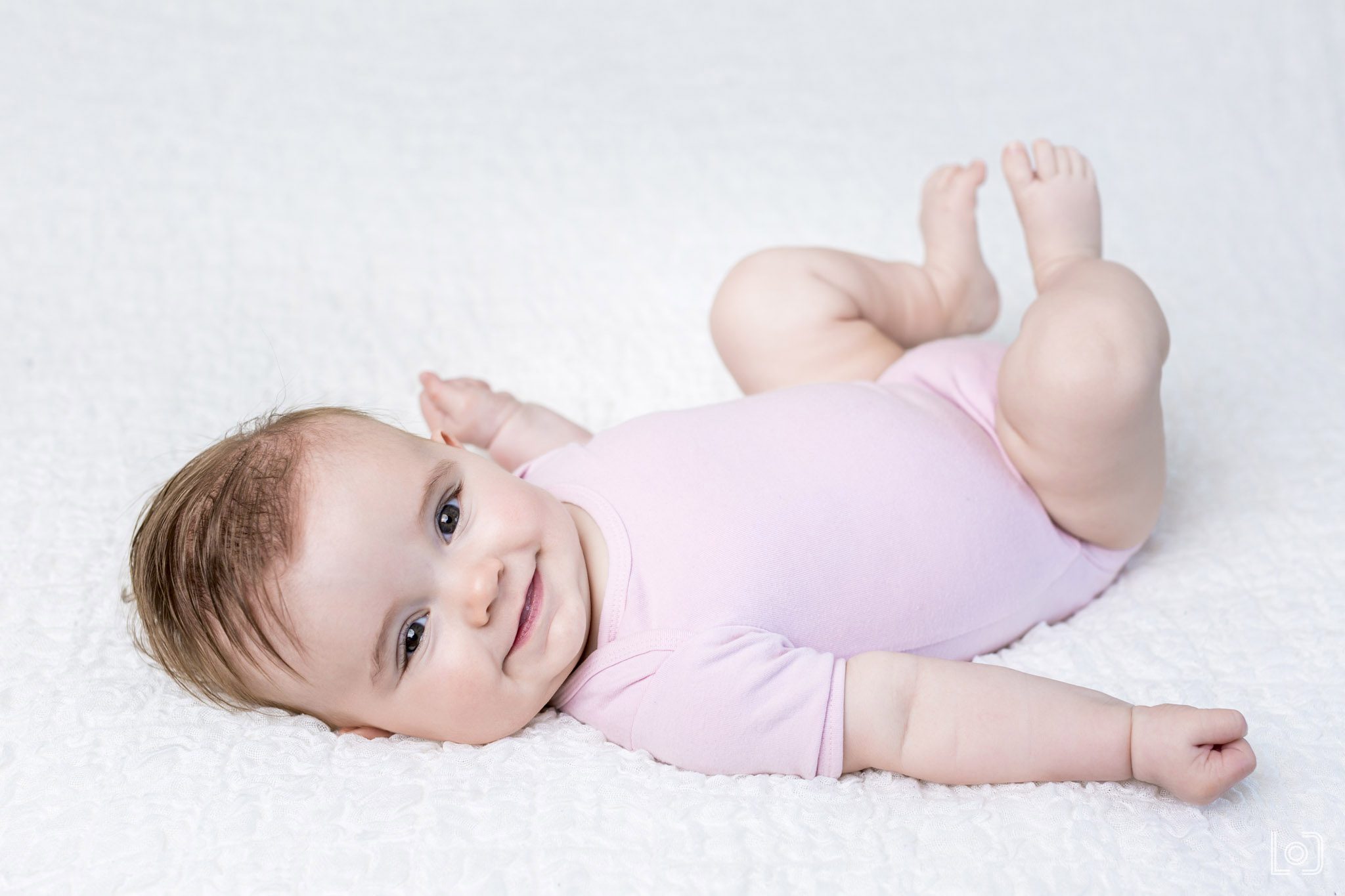Studio fotoshoot van een baby van drie maanden